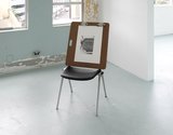 Fiona Connor, Drawing Something Under Itself,#24, 2023, Knoll stacking chair, drawing board, graphite pencil on archival paper, 580 x 1040 x 530 mm overall