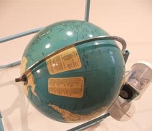 Paul Cullen, Geographer (2), 1995, metal chair, world globe, motor and electric cord. 700 x 800 x 600 mm. Image courtesy of the artist and Jane Sanders.