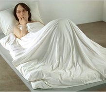 Ron Mueck, In Bed, 2005, mixed media. Image courtesy of Antony d'Offay, London