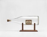 Billy Apple, Ship in a Bottle, 1963, Glass bottle, match box, wooden stand, cork,  12.9 x 26 x 8.3 cm 