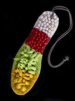 Lisa Walker, Pendant, 2009, paint, rubber, pearls, fabric, wool. Image courtesy of Te Papa and the artist. Purchased 2010.