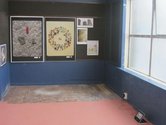 From left to right: one photo by Xin Cheng,  two works by Haru Samehima, and three digital prints by Paul Cullen. On the floor is a Phil Dadson Headstamps video
