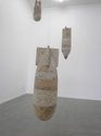 Regan Gentry, some of Bombs 1 -9, carved and glued pumice