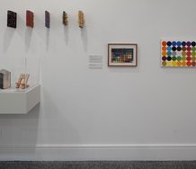 Paper-jams: artists between the covers at the Gus Fisher. On wall works by Paul Cullen and Elliot Collins. Photo by Sam Hartnett