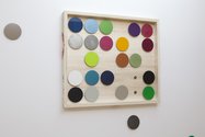 Christoph Dahlhausen, New ways to colour the wall, 2012,60 metal discs (diam.12 cm), car paint, spray paint, aluminium, stainless steel, wooden boxes. Size variable. Image: Jennifer French.