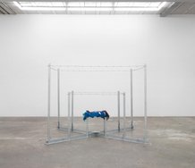 Jim Allen, Arena, 1970 (remade 2012), galvinised steel, barbed wire, clothing donated by family and friends, 2000 mm x 2000 x 2000 mm