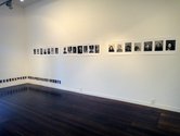 Patrick Pound, The Photographer's Shadow as installed at Melanie Roger. Note: Falling towards New zealand, 2013, 32 postcards, at the bottom of the corner.