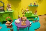 Tessa Laird, The Politics of Ecstasy, 2013, (installation detail). Hand-built ceramics, earthenware with ceramic paint, painted secondhand wooden furniture, custom-built shelves. Dimensions variable.  Courtesy of Auckland Art Gallery Toi o Tāmaki