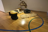Xin Cheng, Propositions, 2013 (installation detail). Vinyl, felted wool, corrugated cardboard, native edible plants, potting mix, bamboo, fabric, plastic, used tires, tiedowns, Paul Hogan’s tire tree idea, used inner bicycle inner tubes and bicycle chains