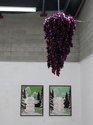 Sam Thomas: Grape Chandelier, Plastic Grapes and LEDS; Ski Holiday 1, and Ski Holiday 2, both oil on aluminium with chain