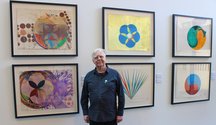 Max Gimblett with The Universe as installed at Calder and Lawson Gallery. Photo by Cheri Waititi, University of Waikato