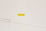Philippa Nielsen, Grounded Theory, detail, yellow string, yellow outdoor masking tape, rock