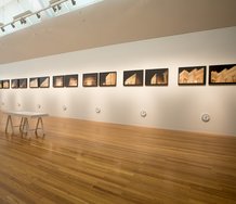 Peter Roche, Museum Piece, 1993, Framing the Museum in Ngā Toi │ Arts Te Papa, 22 August 2014 - 01 March 2015, photographs, clocks, wall text. Purchased 1993 (1993-0040-2). Image Courtesy of Te Papa.