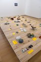 Kate Newby, Mr + Mrs Hands  2014 fired porcelain, earthenware and stoneware, hand formed glass, table, ink on paper various dimensions (35 sets of rocks) on loan from the artist