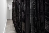 Kathy Temin, The Memorial Project: Black Wall, 2015  5.5 x 12.5 m x 2.95 m. As installed at the Gus Fisher Gallery. Image courtesy of the artist. Photo: Sam Hartnett.