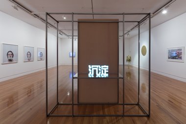Installation of Visiting Asia at Te Tuhi. In the centre is  Jade Townsend, Ancient, 2014, LED light, 500 x 240 x 800 mm. Courtesy of the artist. Photo: Sam Hartnett