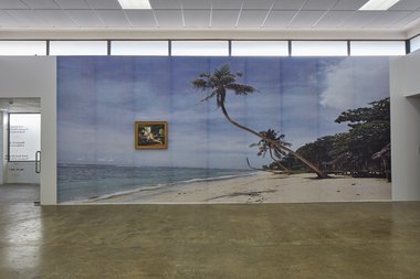 Yuki Kihara, Odalesque (After Boucher), 2017, printed canvas, frame, positioned on Paradise , 2017, large scale poster. Photo: Sam Hartnett.