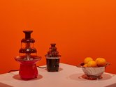 PᾹNiA!, (Do Not Use Marcel Duchamp), 2019, found chocolate fountains, chocolate, tables, three pieces, overall dimensions variable. Photo: Sam Hartnett
