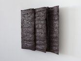 Isabella Loudon, Edge (mud), 2021, concrete, pigment, fabric and board, 560 x 510 x 200 mm