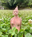 Kazue Miyahara,  Rice Planting Festival / Smile, 2020.  Photographs. Detail. Statue made of clay and red iron oxide.