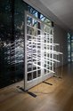 Bill Culbert, An Explanation of Light, 1984, 2020, French doors, fluorescent tubes, white electrical cords. As installed in Auckland Art Gallery Toi o Tamaki. (Installation photography by Jennifer French.)