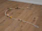 Lucy Meyle, Snake's dress (like a fruit and its skin), 2020, silver-plated chain, jump rings, real and fake foods, dimensions variable
