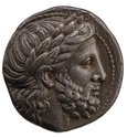  Image of Zeus on a silver coin to commenorate Philip II of Macedon about 359-336 BCE, diameter 2.3 cm. Courtesy of the Trustees of the British Museum.