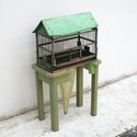 Julia Morison, Missing thing, 2011, bird cage, table, plug & silk cloth, 540 x 480 x 280 mm