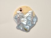 Octavia Cook, M (Mermaid) brooch, 2022, acrylic, Mother of Pearl shell, silver, copper (freckles). 89 x 93 x 6 mm--back