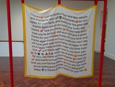 Louise Menzies, Just So You Know, 2022, (yellow border, text/images) digital print, silk, wood. Photo: John Hurrell