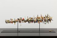 Ruth Watson, Flashback, 2022-24, souvenirs, aluminium bay, museum support,  93 x 21 x 18 cm