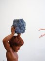 Ronnie van Hout, Daemon with Rock, 2924, detail, painted resin, wig, 1420 x 500 x 405 mm