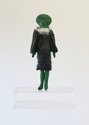 Te Maari, (E) Tiakiawa Tahuriorangi-Tute of Peachgrove Rd, 2024, felt, wool/mohair (knitted/crocheted elements), cotton (embroidery), custom acrylic stage 31 x 15 x 5 cm (figure), 32.8 x 25 x 14 cm (stage)