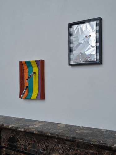 Rohan Hartley Mills, (left) Fools Gold, 2023, aluminium foil and acrylic paint on newsprint and cardboard (right) Crayola Payola, 2024, Oil on papier-mâché and cardboard.