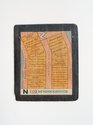 Denis O'Connor, N for Neighbourhood, 2024, pigment , wax on Welsh slate, 295 x 250 mm